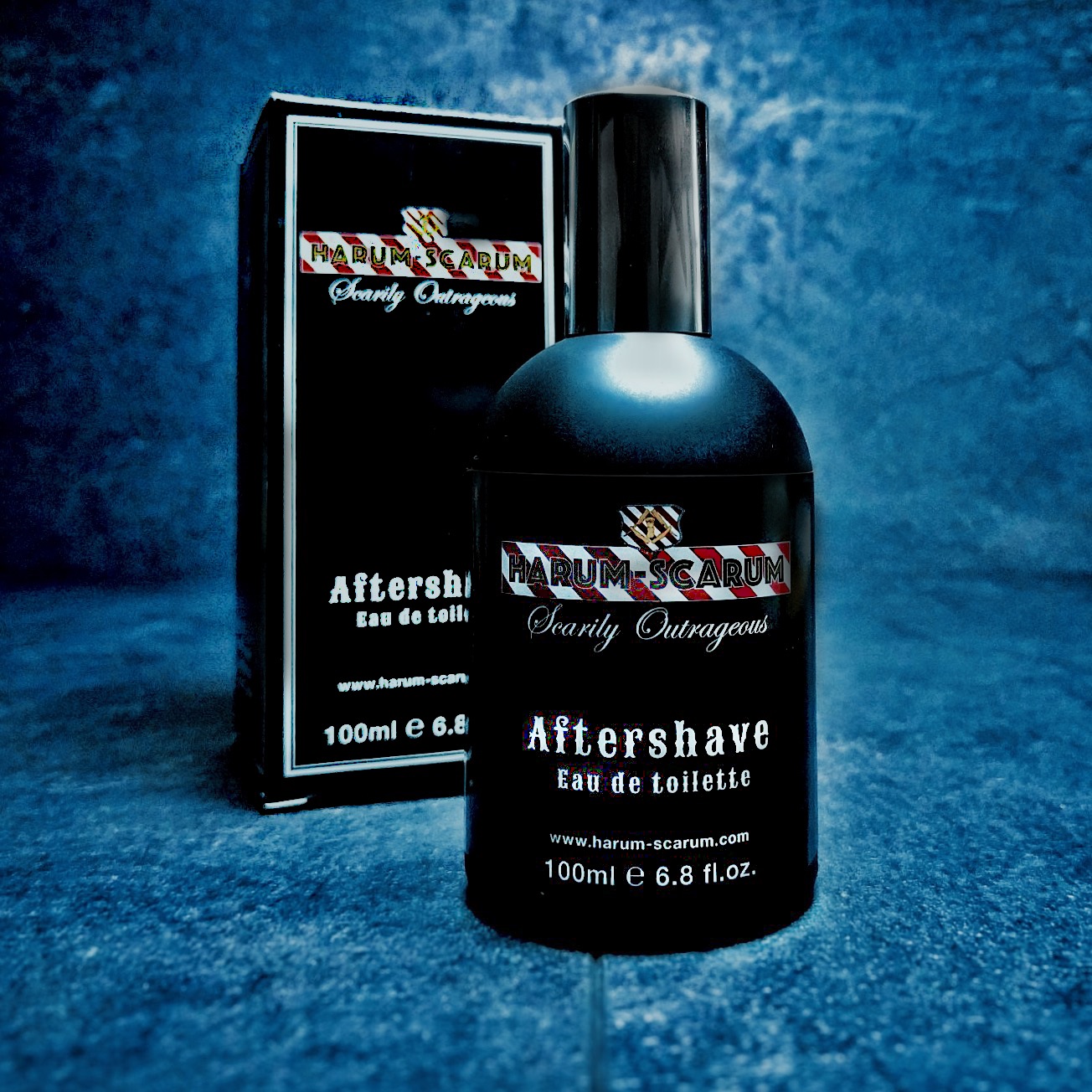 Black bottle of Men's Aftershave in front of Box
